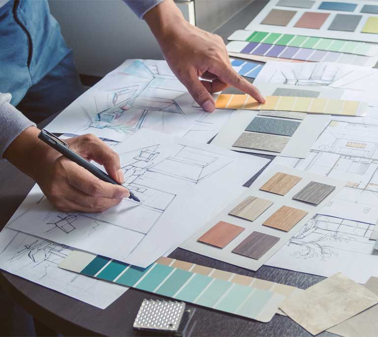 Values Image 8 - Man doing technical drawings with colour swatches