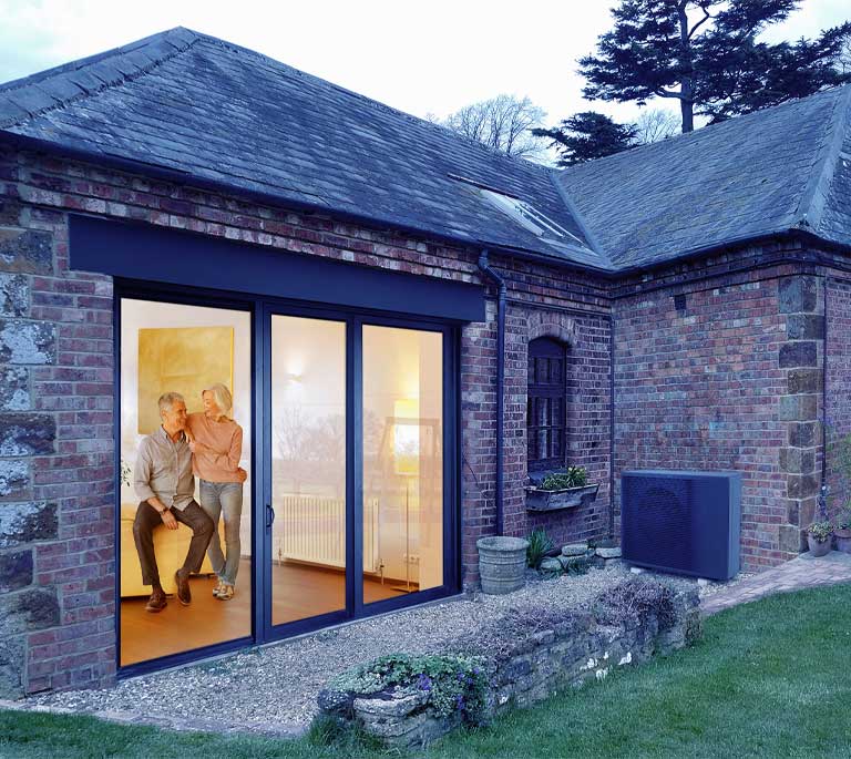 Daikin Heat Source Pump in situ outside a house